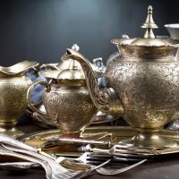 Silver,Dishes,On,Old,Background